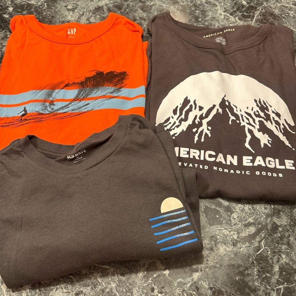 Three large T-shirts for one price… American Eagle, Old Navy, Gap..  ￼like New